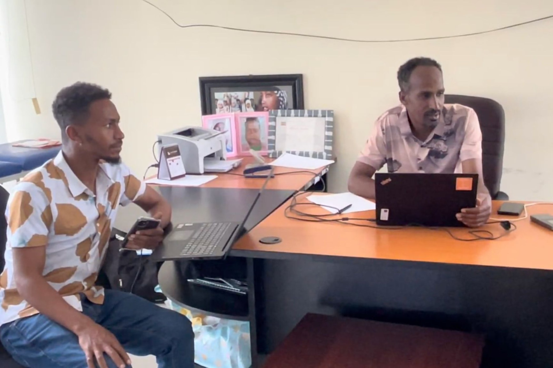 Project Harar's cleft-care team working on donated laptops in their office.
