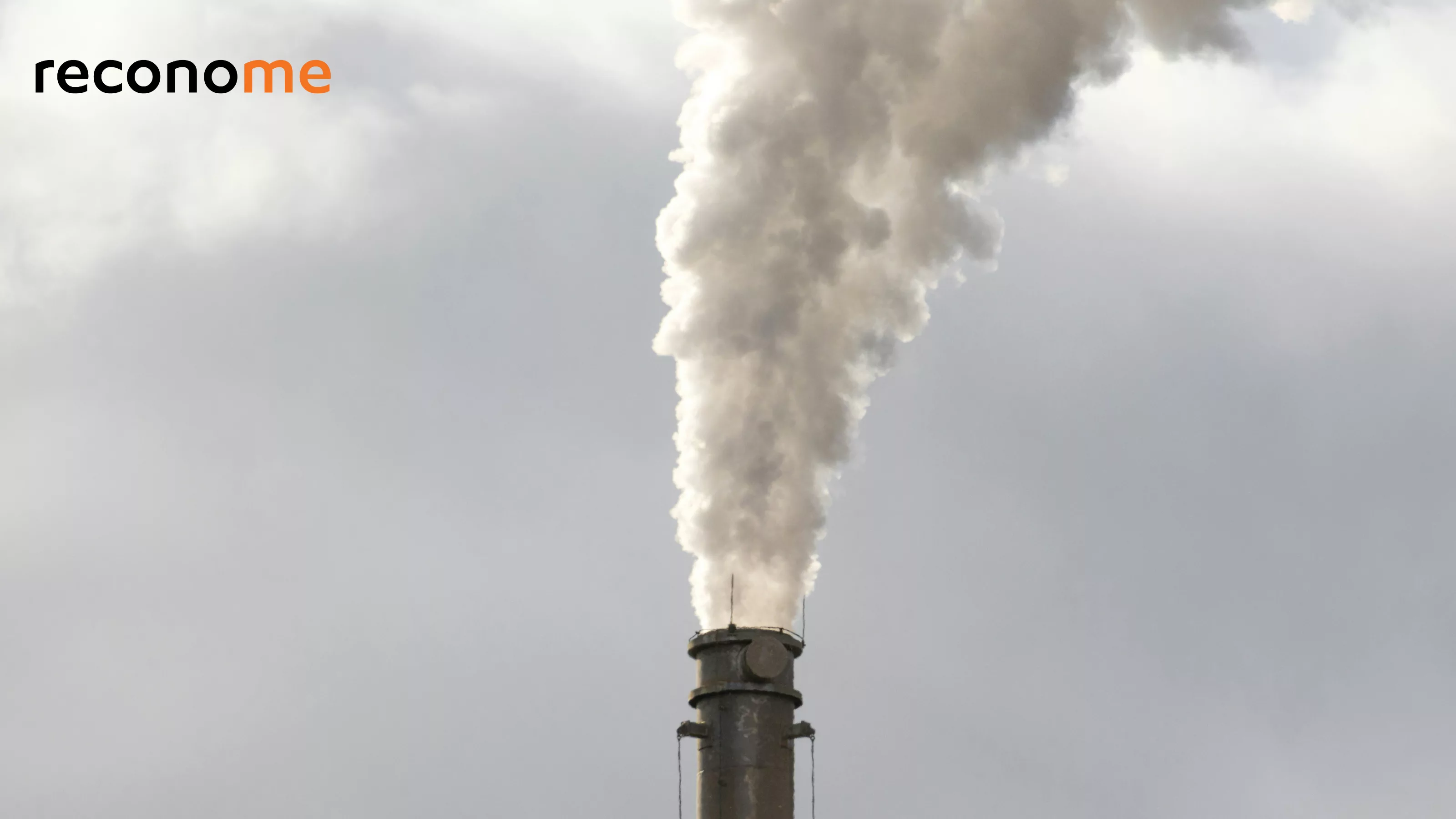 A factory chimney emitting smoke.