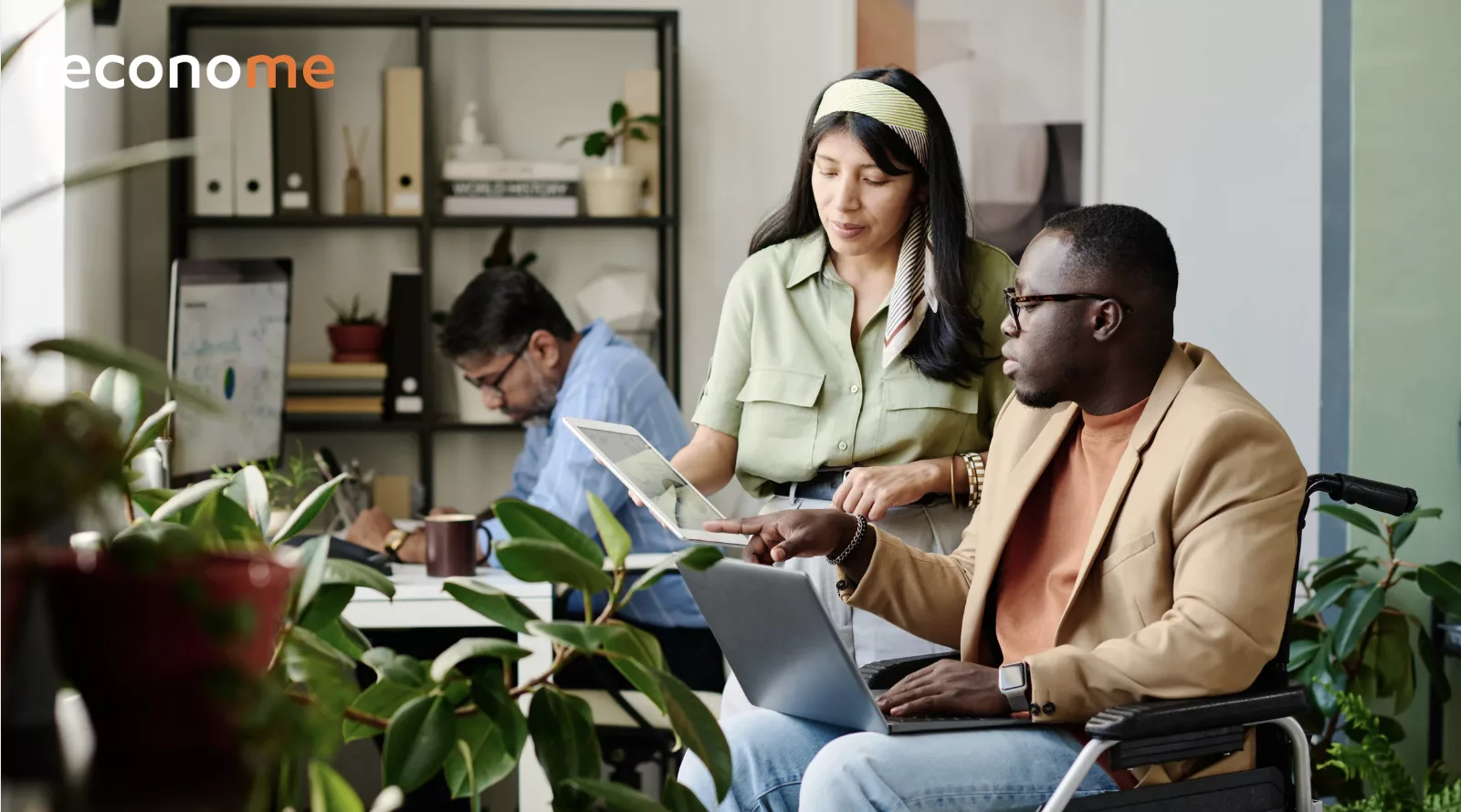 People sitting together in a meeting room.