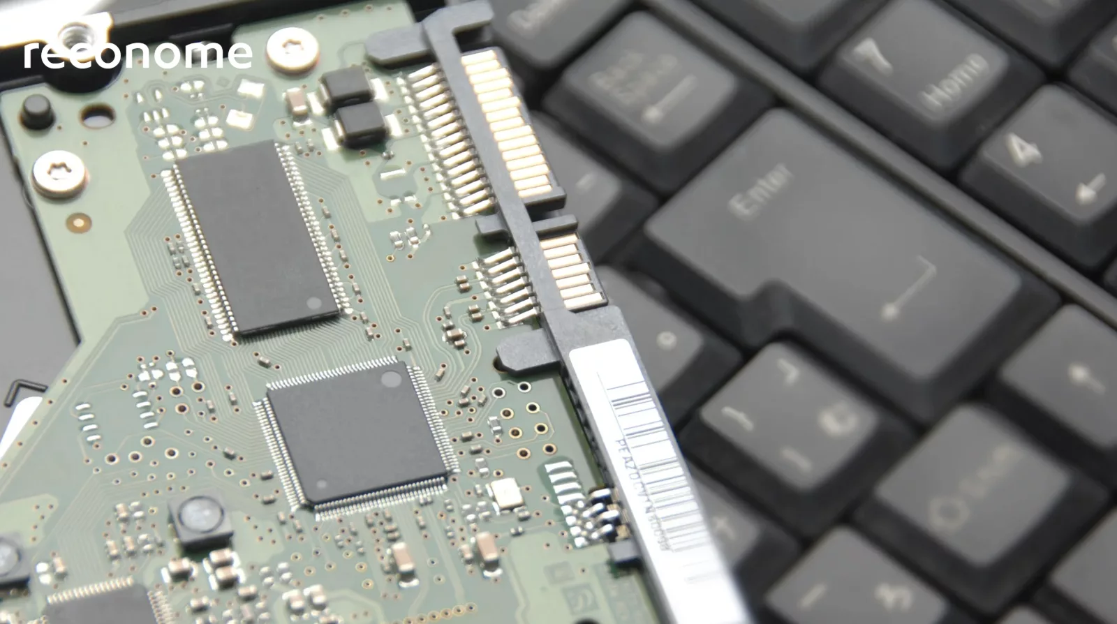 A close-up of a circuit board and keyboard.