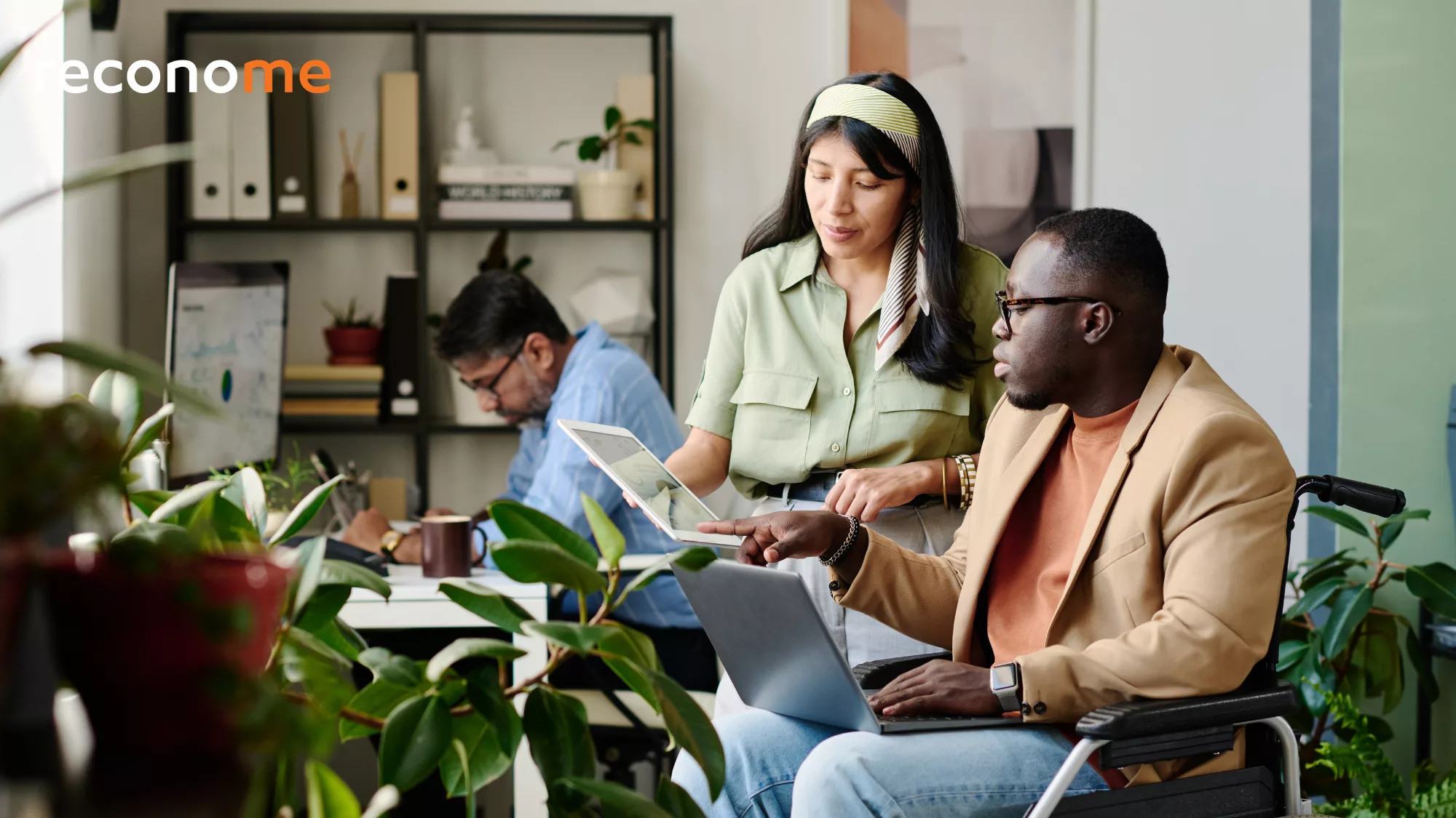 People sitting together in a meeting room.
