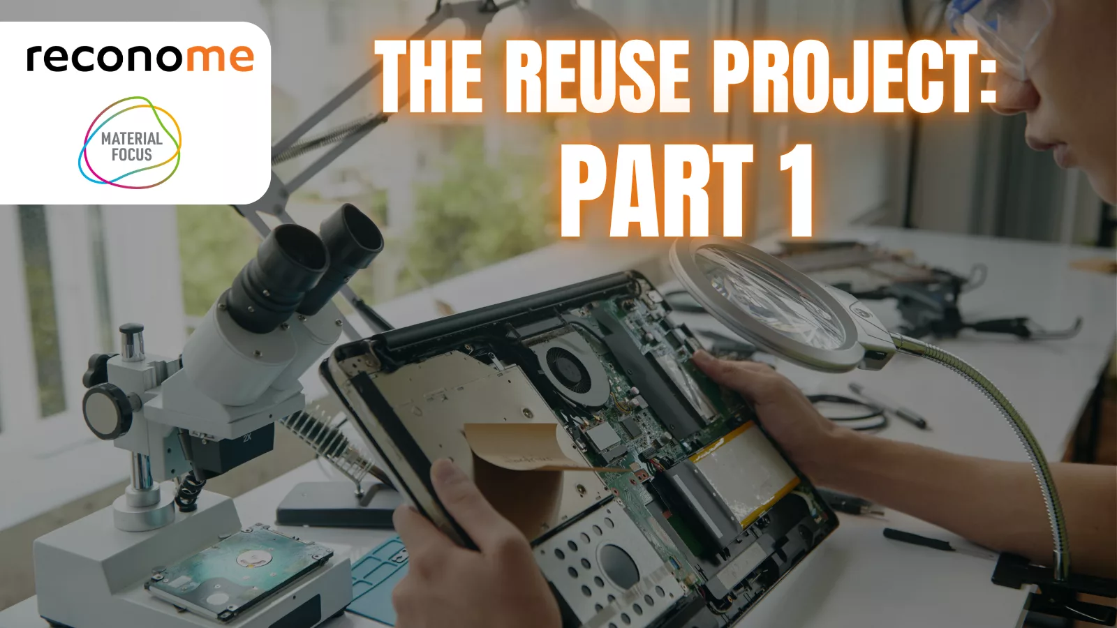 Electronics being repaired under a magnifier.